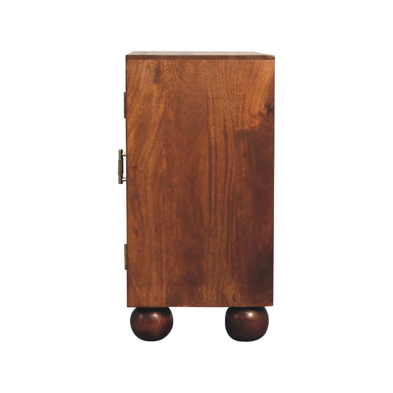 Wooden cabinet on spherical feet.