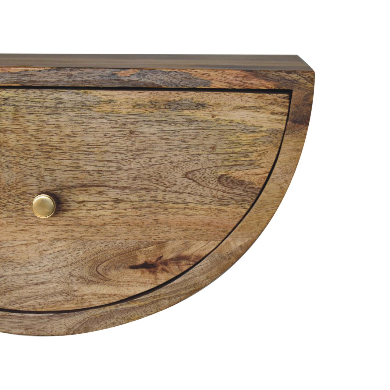 Semi-circular wooden cabinet drawer detail.